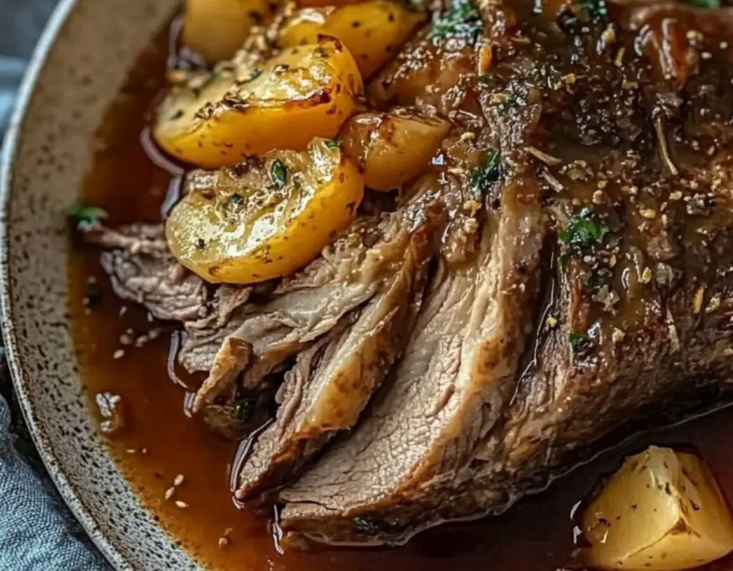 Slow-Cooked Beef Roast with Potatoes