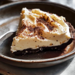 Chocolate Cream Pie with Whipped Topping and Cocoa Dusting