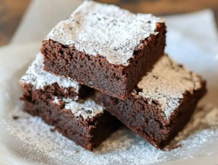Fudgy Chocolate Brownies with Powdered Sugar
