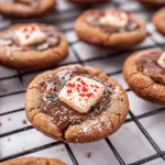 Peppermint Bark Chocolate Thumbprint Cookies with Melted Chocolate Centers and Festive Candy Topping